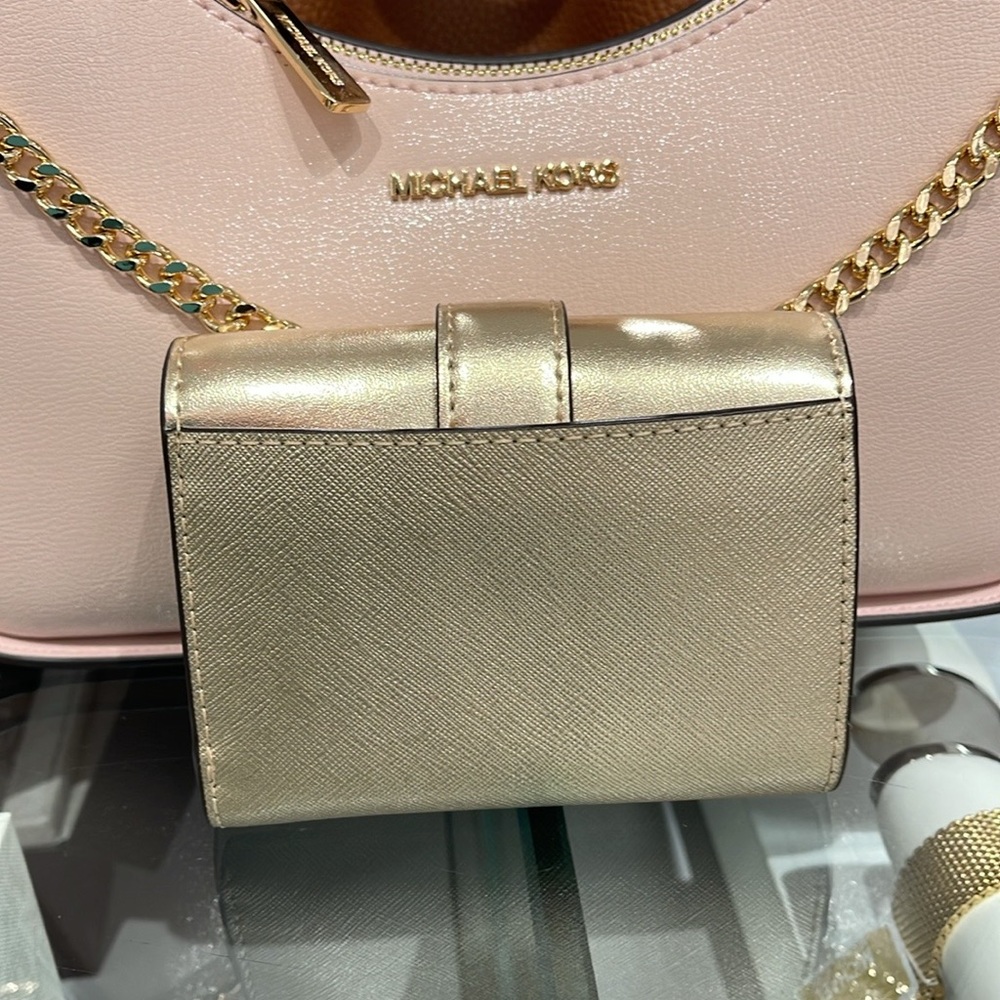 MICHAEL KORS CARMEN MEDIUM LOGO AND FAUX LEATHER WALLET
PALE GOLD 
NWT - Picture 14 of 16